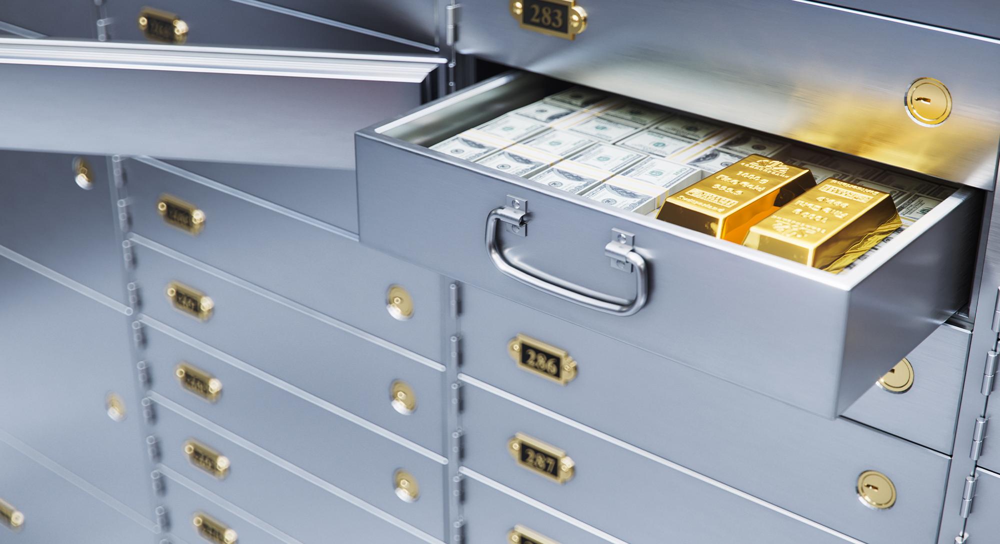 safe deposit box with money and gold